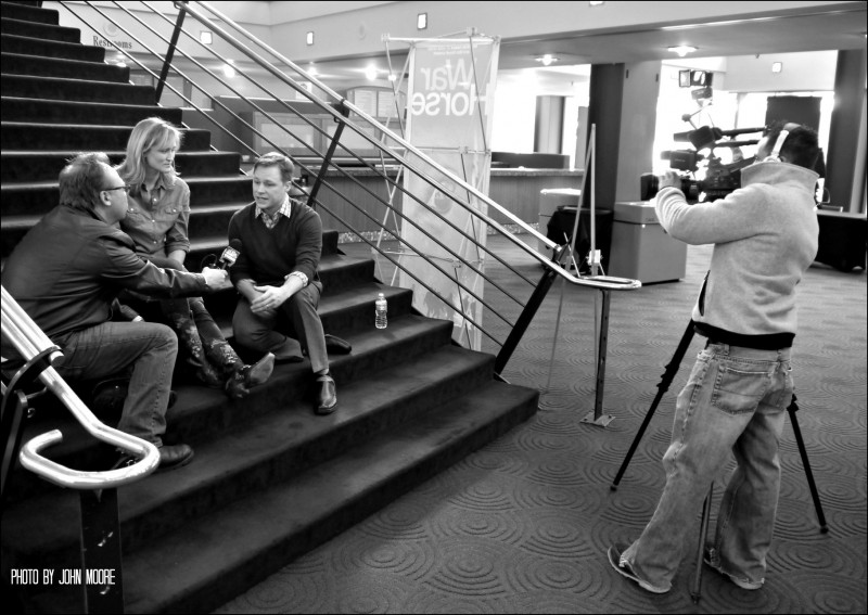 Local NBC anchor Kirk Montgomery interviews cast members Angela Reed and Mat Hostetler, who graduated from Colorado high schools. Photo by John Moore. 