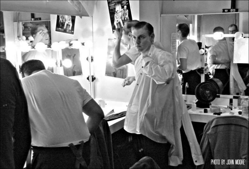 The cast prepares for its first appearance in front of an audience. Photo by John Moore.