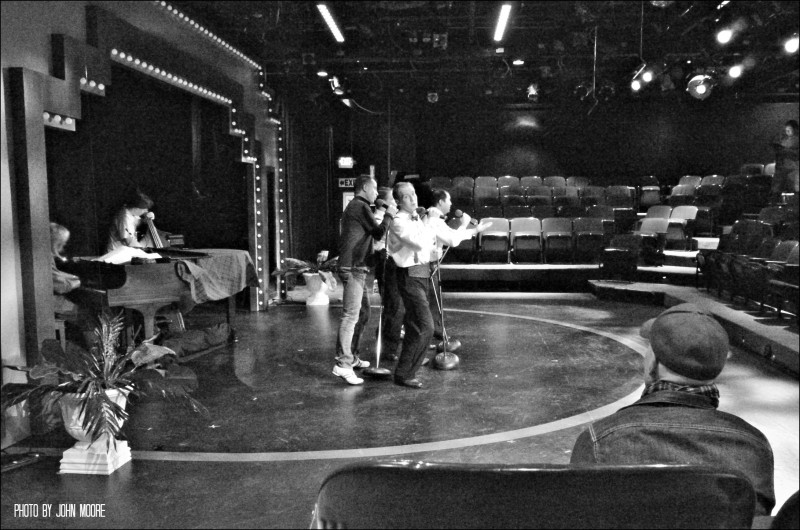 Director Nick Sugar offers some final suggestions before the first audience is allowed into the Town Hall Arts Center. Photo by John Moore. 