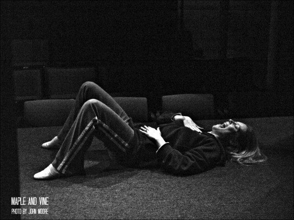 Actor C. Kelly Leo goes through physical and vocal exercises on the stage long before the theater is opened to audience members. Photo by John Moore. 