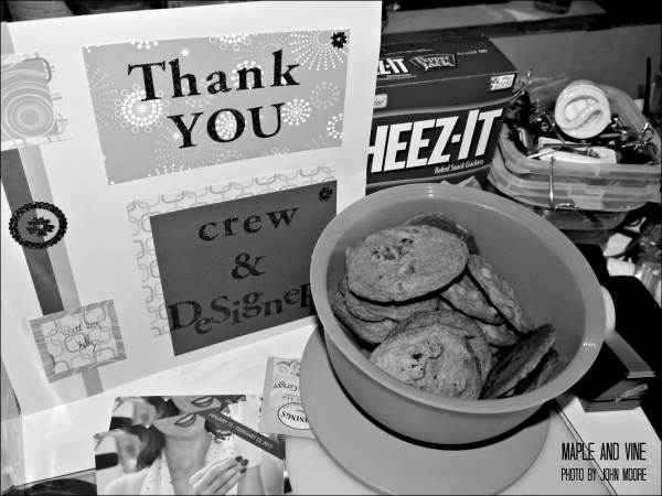 The cast and crew are treated my treats, in this case chocolate chip cookies from actor C. Kelly Leo. Photo by John Moore. 