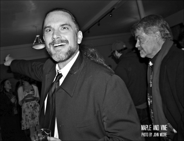 Curious Theatre founder Chip Walton playfully responds to being reminded of the Broncos' overtime playoff loss. Photo by John Moore. 